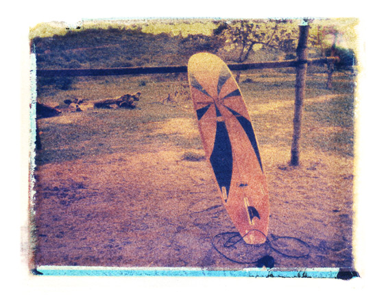 surfboard + fence